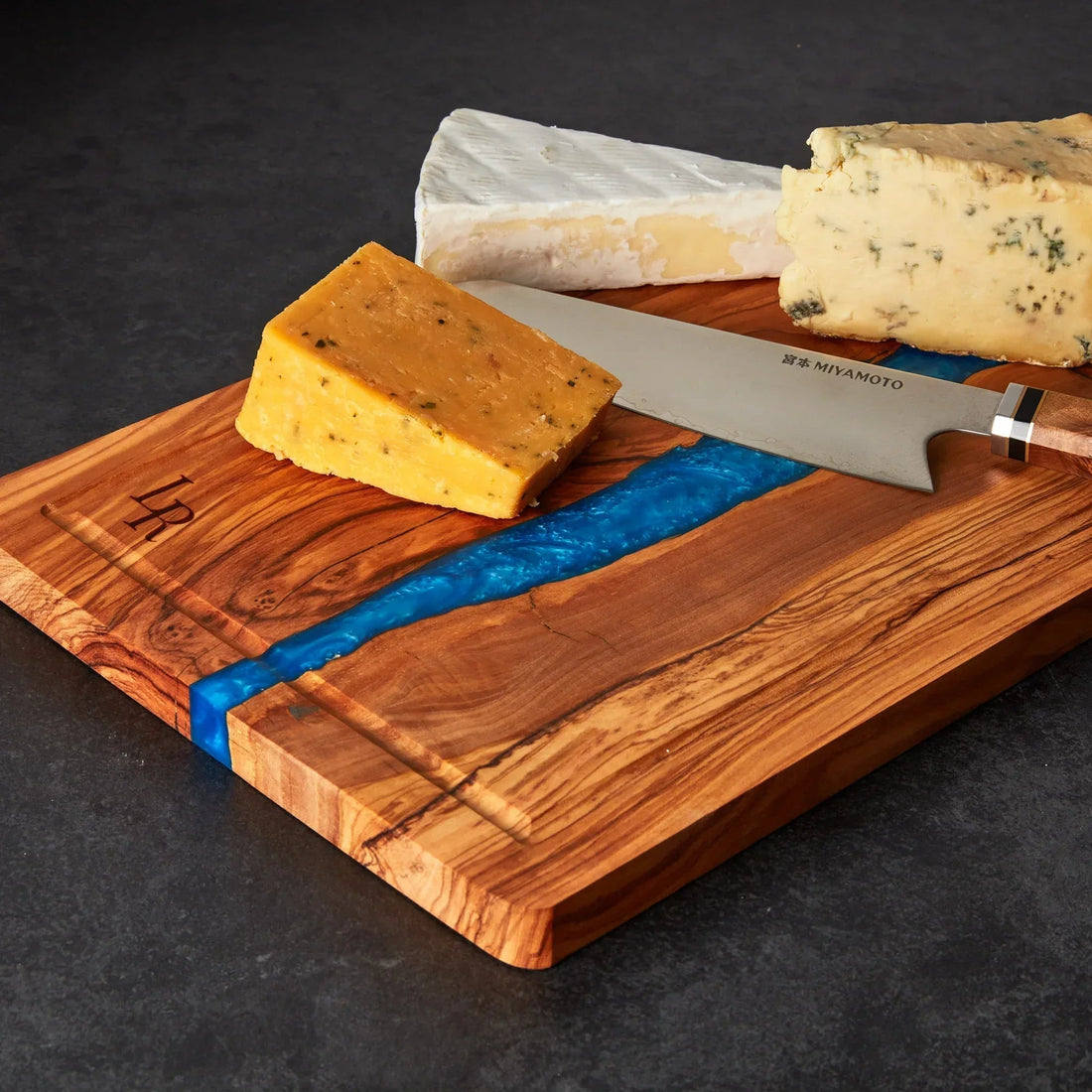 Natural olive wood chopping board with distinctive grain